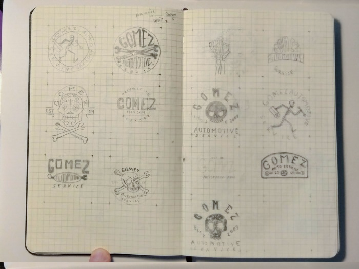 gerardo automotive services logo sketches in a notebook